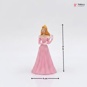 Princess figurine in a pink dress with measurements on a white background, featuring the Bakey brand.