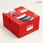 A red bakery gift box with a printed photo of strawberries and cake slices on the lid, featuring the text 'time to CELEBRATE' and a Bakeyy logo in the top right corner.