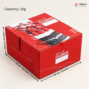 A red cardboard bakery box with printed food photos and dimensions shown on a light beige background. Black measurement arrows and text indicate capacity 1Kg and box measurements of 25 cm x 25 cm x 12.