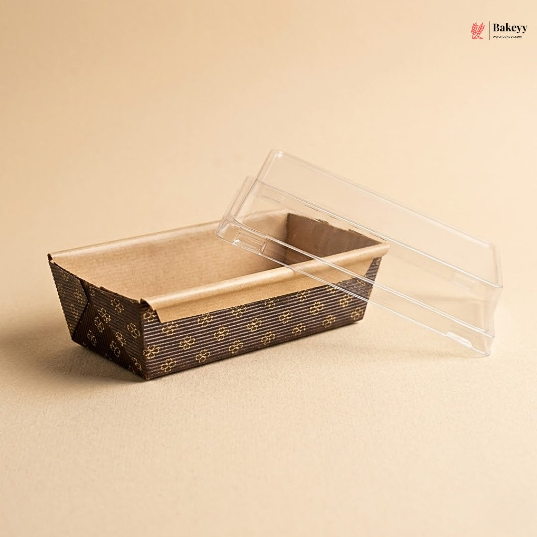 Bakery loaf pan with clear lid on a beige background