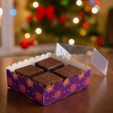 Box of brownies with a festive background