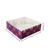 Decorative purple cake box with floral patterns and measurements on a white background
