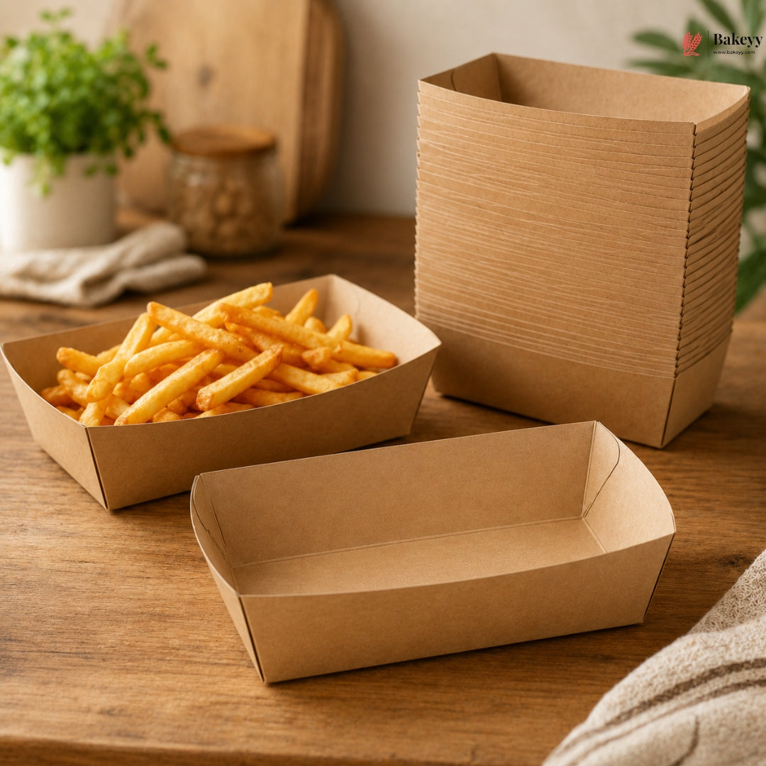 Kraft paper food containers with fries on a wooden surface