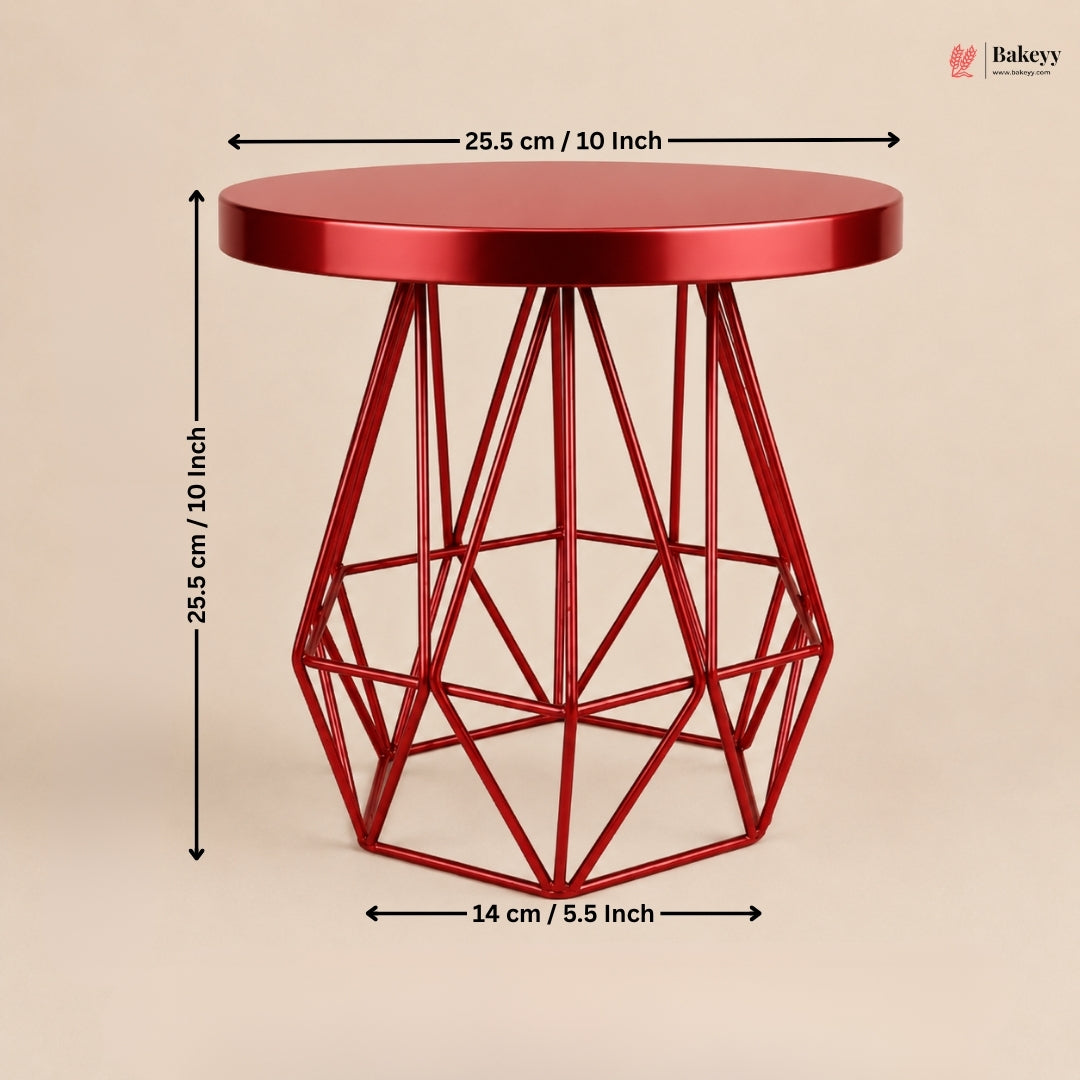 Red geometric side table with dimensions on a beige background