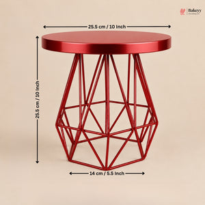 Red geometric side table with dimensions on a beige background