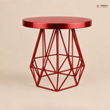 Red geometric side table on a beige background