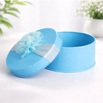 RoundDecorativeMetalTinBoxwithRibbon - Bakeyy.com