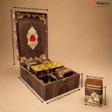 An ornate dark brown decorative storage box with gold detailing, shown open with smaller matching boxes inside. Black dimension arrows and labels indicate the measurements of the box and a separate matching container on a plain beige background.