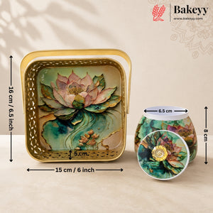 Decorative square metal cake pan with a floral lotus design, shown alongside a matching round candle holder and a circular inset detail. Black dimension lines and text indicate measurements of 16 cm height, 15 cm base, and 6.