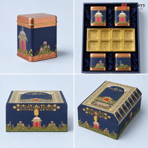 Four-panel product display of a decorative tea tin set on a pale blue background. The set includes one square tin shown closed from the front, a boxed set of five matching tins with gold trays and a gold lid insert, one front view of the closed square tin, and one angled view of the lid.