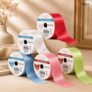 Set of colorful ribbons on spools with 'melania' branding against a neutral background.