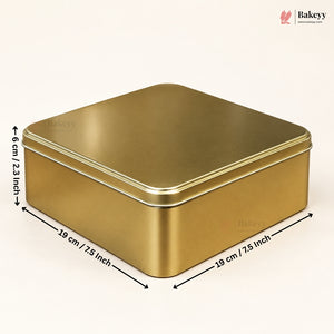 A square metallic gold tin container with dimension arrows and labels showing 19 cm by 19 cm by 6 cm, on a light beige background with a Bakeey logo in the top right.