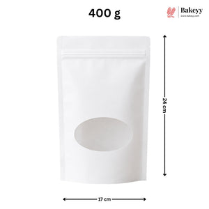 White stand-up pouch packaging with a die-cut oval window, shown with dimension arrows labeled 24 cm tall and 17 cm wide, plus '400 g' text and a Bakeey logo in the top right.