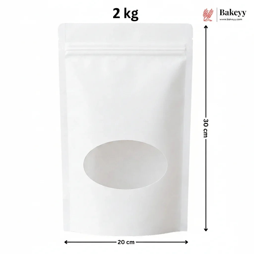 A white stand-up pouch packaging with a die-cut oval window, shown with dimension lines indicating 20 cm width and 30 cm height, with '1 kg' text at the top and a Bakeey logo in the upper right.