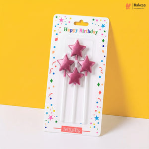 Packaged pink star-shaped birthday candles with colorful confetti design on a yellow background