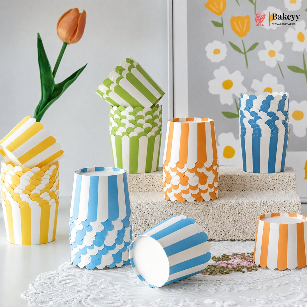 Colorful paper cups with patterns on a decorative surface
