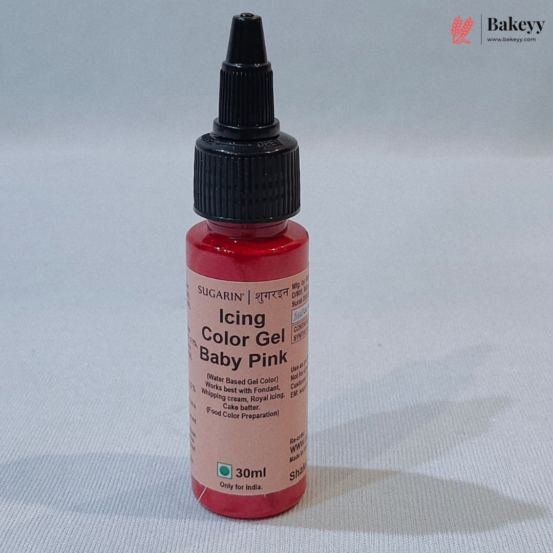 A 30ml bottle of Sugarin Icing Color Gel in the shade Baby Pink, featuring a black cap and a light pink label, set against a neutral light gray background.