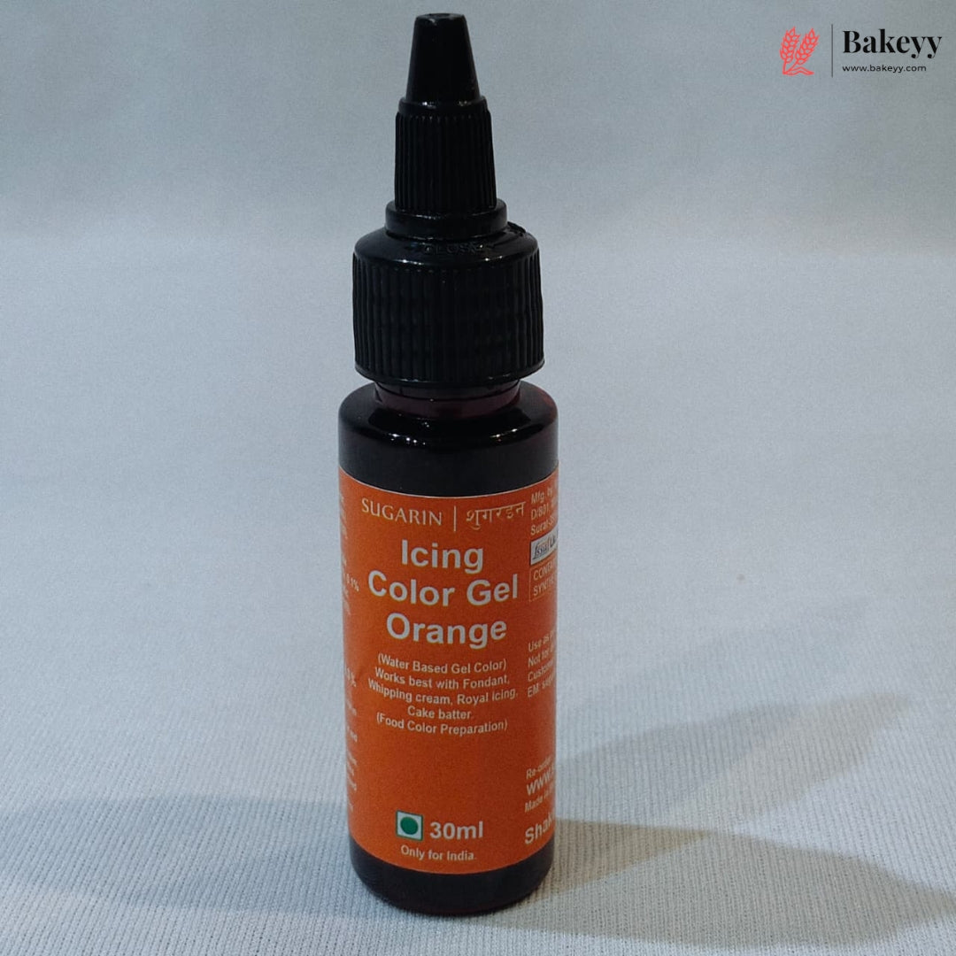 A 30ml bottle of Sugarin Icing Color Gel in Orange flavor, featuring a black dropper cap and an orange label, set against a light gray background.