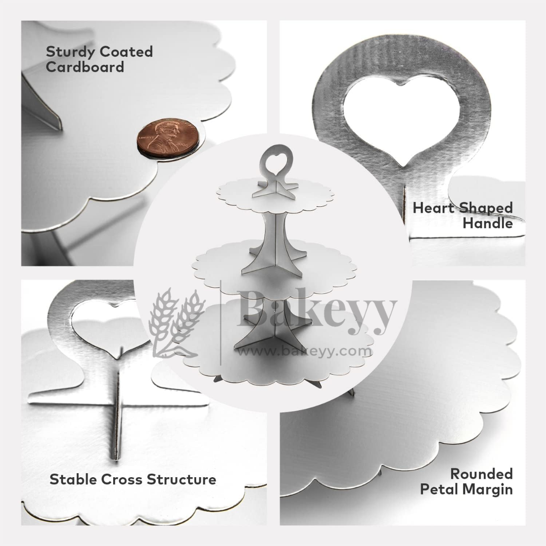 Bakeyy product with heart-shaped handle, sturdily coated cardboard, stable cross structure, and rounded petal margin on a white background.