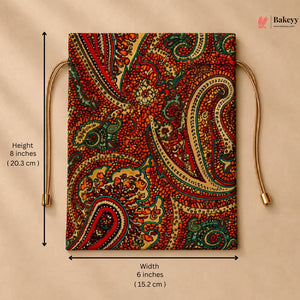 A square fabric pouch with a detailed paisley pattern in red, green, beige, and gold, featuring drawstring ties. The image includes dimension lines indicating a height of 8 inches (20.