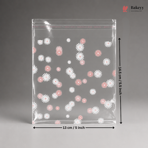 Clear plastic bag with floral pattern and dimensions on a gray background