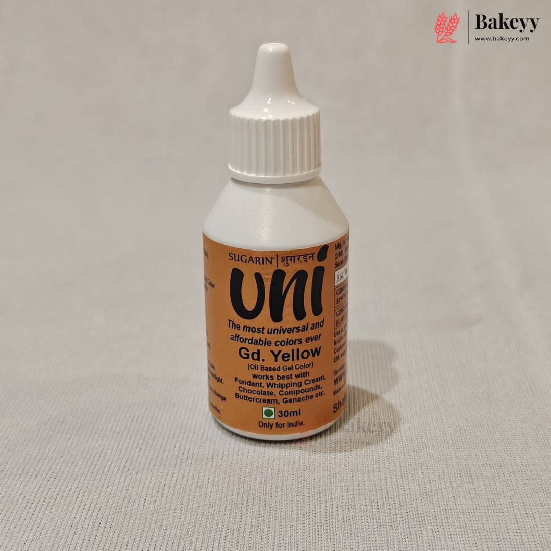 A 30ml bottle of Uni Gd Yellow food coloring powder by Bakeey, featuring a white plastic cap and a brown label with black text, set against a neutral light gray background.