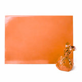 Glossy orange wrapping sheet and gift bag for bakery hamper packaging from Bakeyy.com