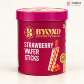 A tub of BYOND Strawberry Wafer Sticks on a clean white background. The packaging is a deep magenta pink with gold and white branding, and an illustration of two striped wafer sticks with a strawberry on top.