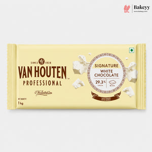 A 1 kg bar of Van Houten Professional Signature White Chocolate in a pale cream-colored wrapper, shown against a light gray background with a Bakeyy logo in the top right corner.