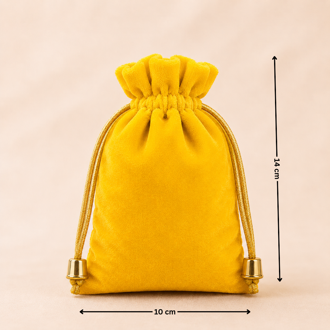Yellow velvet drawstring bag with measurements on a beige background