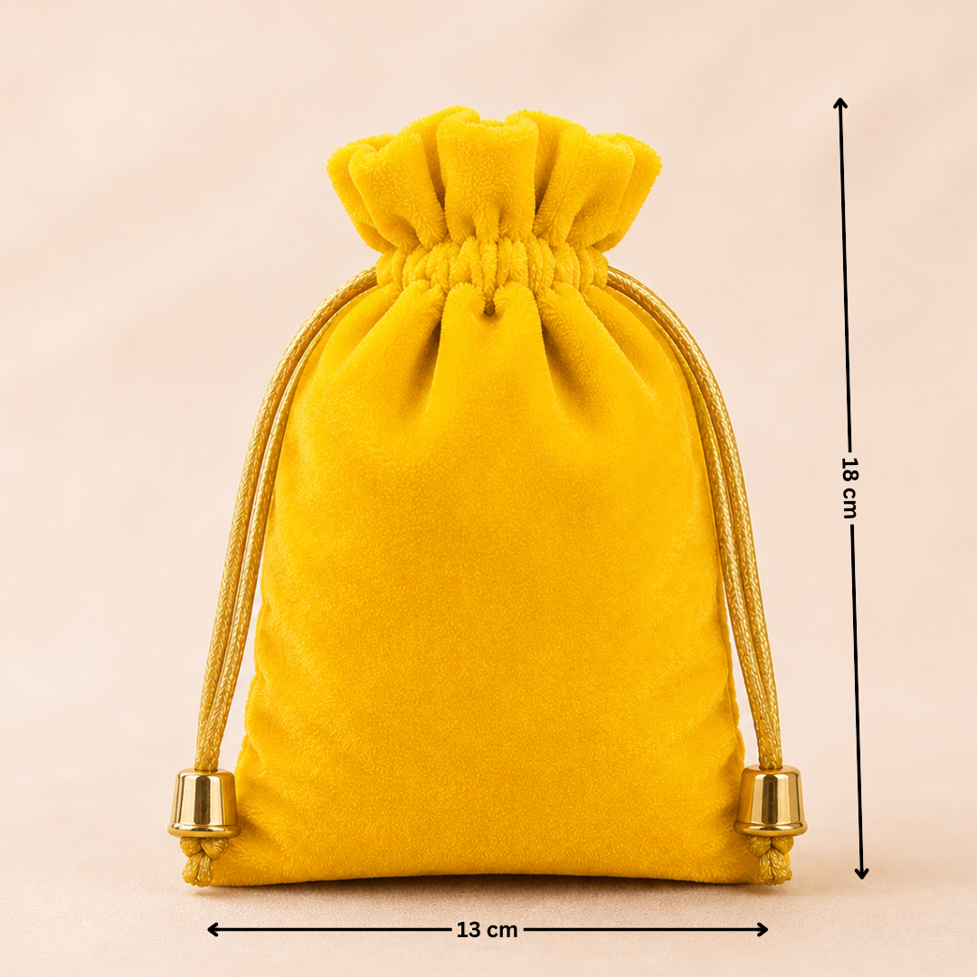Yellow velvet drawstring pouch with measurements on a beige background