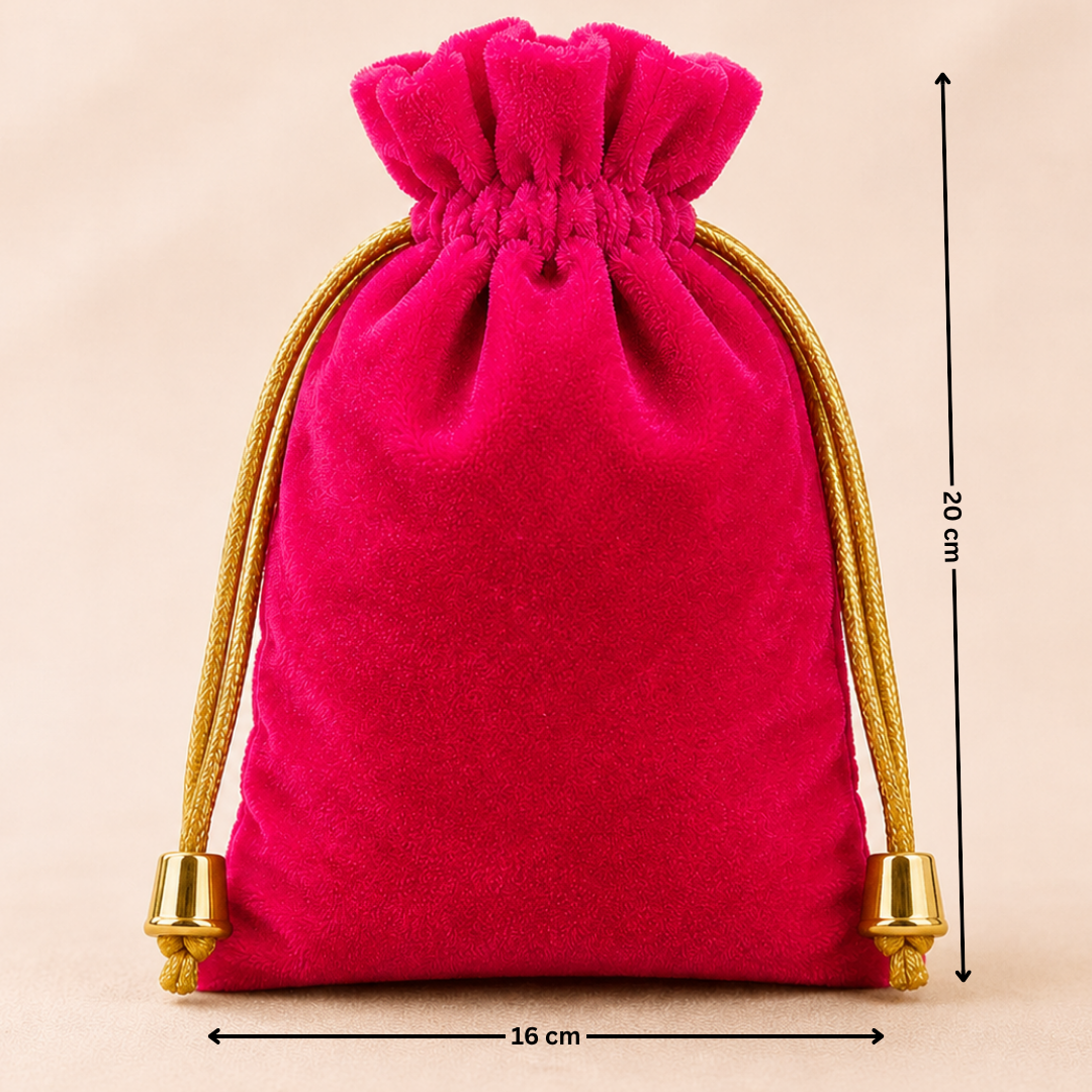 Pink velvet drawstring bag with gold tassels and measurements on a beige background