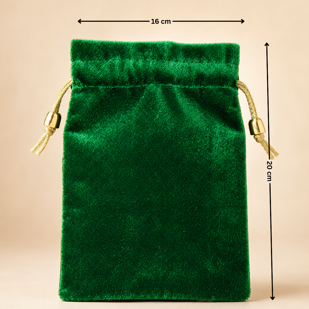Green velvet drawstring pouch with measurements on a beige background