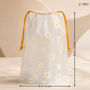 Drawstring bag with daisy pattern and measurements on a beige background