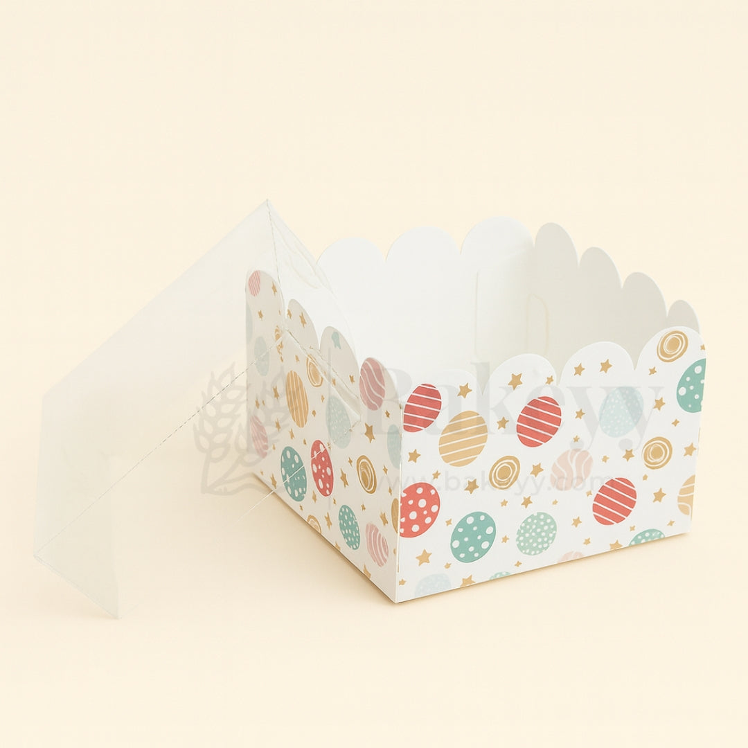 Decorative paper box with colorful patterns on a beige background