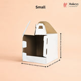 Small cardboard cat house with dimensions on a beige background, featuring the Bakey brand.