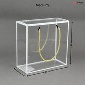 Clear cube with yellow rope inside, dimensions labeled, on a gray background