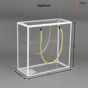 Clear cube with yellow rope inside, dimensions labeled, on a gray background