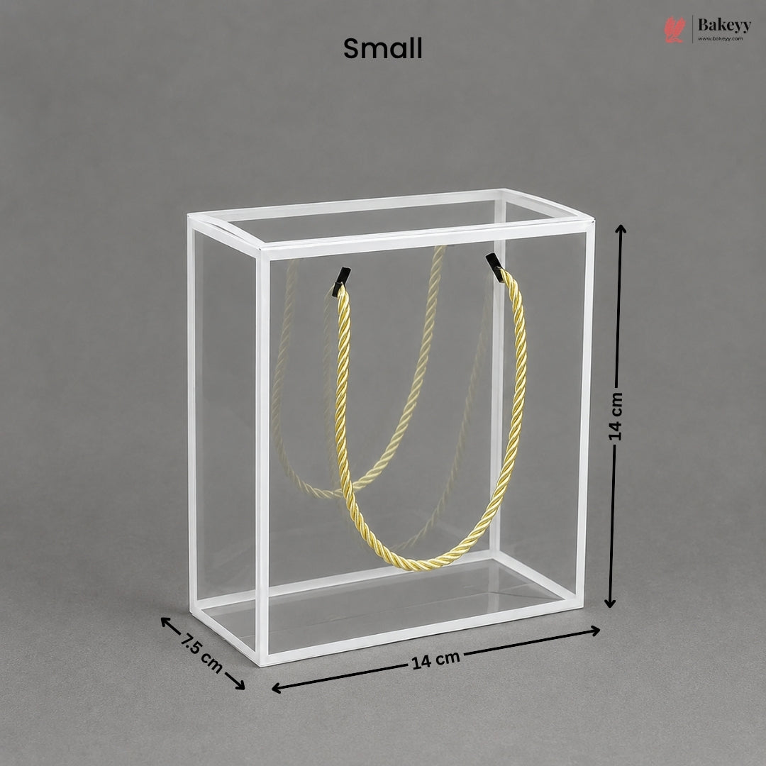 Small clear cube with yellow rope inside, dimensions labeled, on a gray background