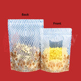 Clear packaging bag with blue zebra pattern on a red background