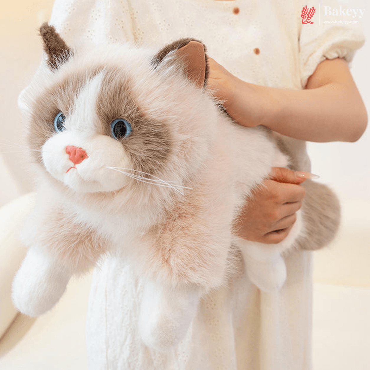 Person holding a plush cat toy with a soft white and brown color scheme.
Cute Plush Cat Backpack | Meow Sound Interactive | Wearable Storage Soft Backpack Toy | Pack of 1
