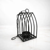 Black metal diya stand with chain, modern gift decor on white background for Bakeyy.com
