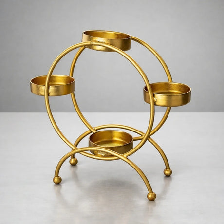 Gold metal diya stand with four round holders for decorative display, Bakeyy wholesale decor