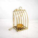 Gold metal diya stand with geometric design, decorative home decor from Bakeyy.com