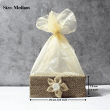 Medium brown net basket with jute flower decoration, ideal for gift packaging or hampers from Bakeyy.com
