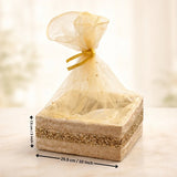 Golden net hamper basket with decorative ribbon, ideal for gift packaging and baking supplies, Bakeyy