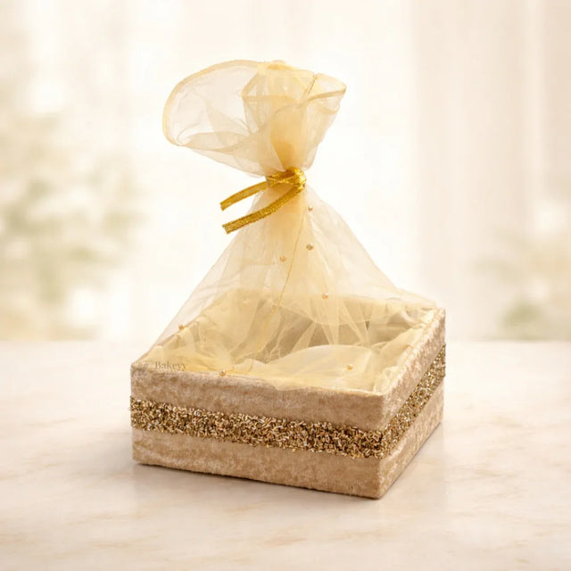 Elegant gold velvet net basket for gift packaging from Bakeyy, ideal for hampers and baking supplies
