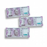 Precut edible wafer sheets shaped like Indian 2000 rupee notes for cake decoration from Bakeyy