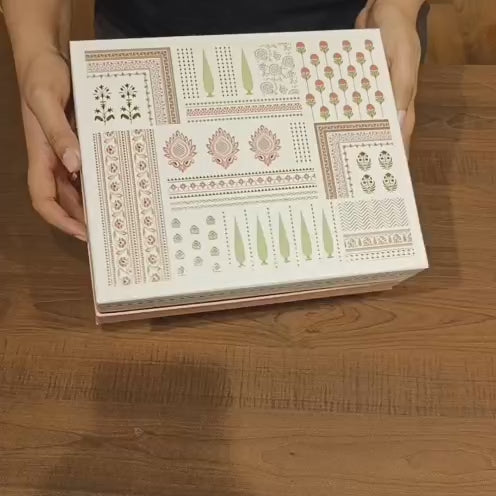 Premium rigid box with festive decorative lid for an upscale look
Gold cavity tray insert for neat, secure sweet/chocolate placement
Dual-compartment layout: sweets tray section + 2-jar space
Strong structure to help protect items during handling &amp; transport
Ideal for gifting: weddings, festivals, corporate gifting, return gifts, hampers
Reusable as premium storage or keepsake packaging