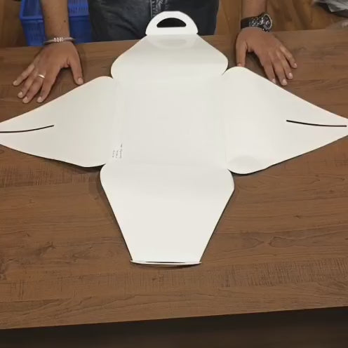 
• Unique curved pillow style top with built-in handle
• Made from durable food-grade white paperboard
• Secure interlocking flap closure
• Easy to carry and convenient to assemble
• Natural rustic finish for premium presentation
• Lightweight yet strong structure